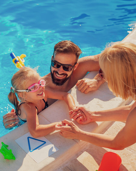 Family in pool