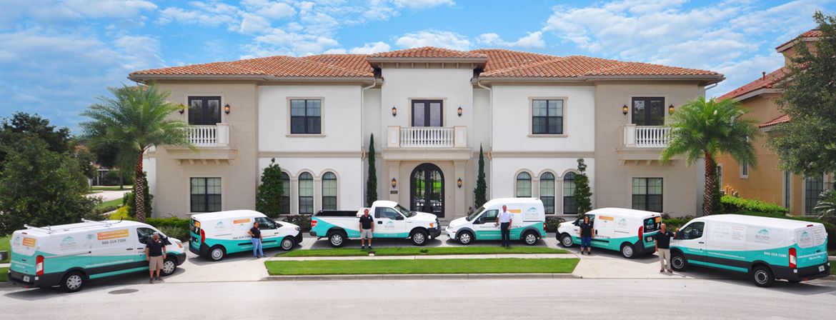 home with company vans outside